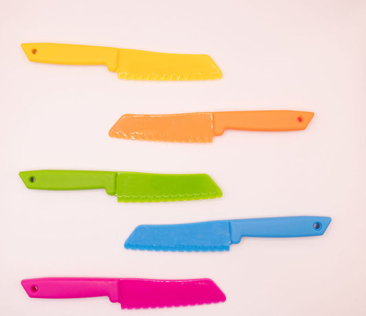 Noonys kid safety knife in five colours - yellow, orange, green, blue and pink